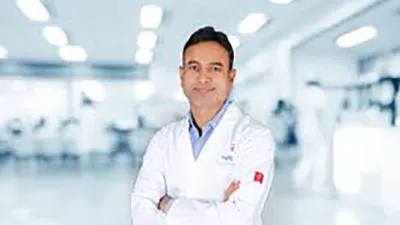 Dr. Mangesh Borkar