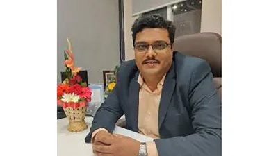 Dr. Bhushan Mhetre