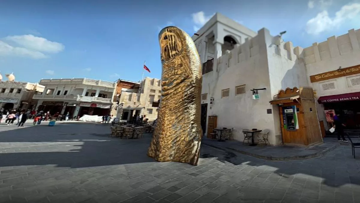 The Golden Thumb Statue 2