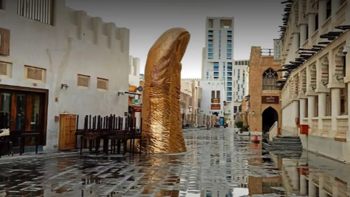 The Golden Thumb Statue 4